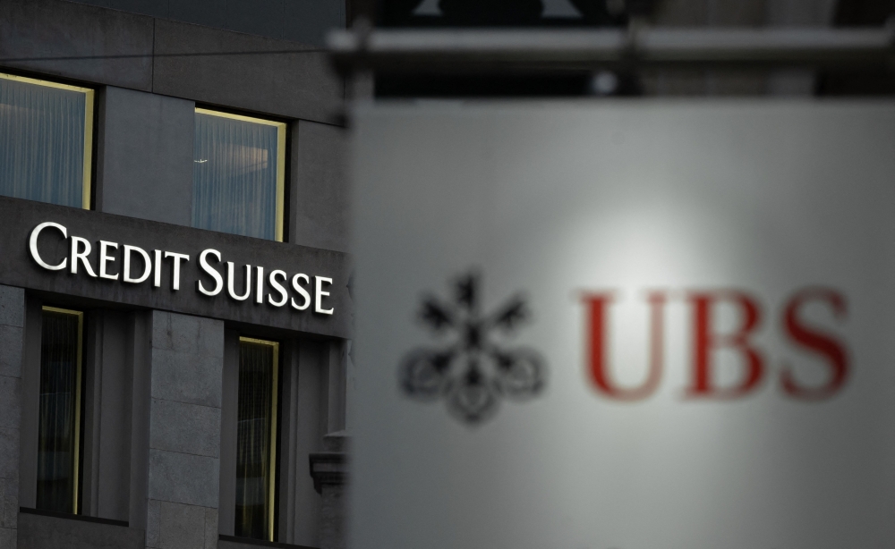Credit Suisse is in advanced talks with its larger Swiss rival UBS about a deal to salvage Switzerland’s second-biggest bank, in a bid to reassure investors before the markets open next week, several media reported yesterday. — AFP pic
