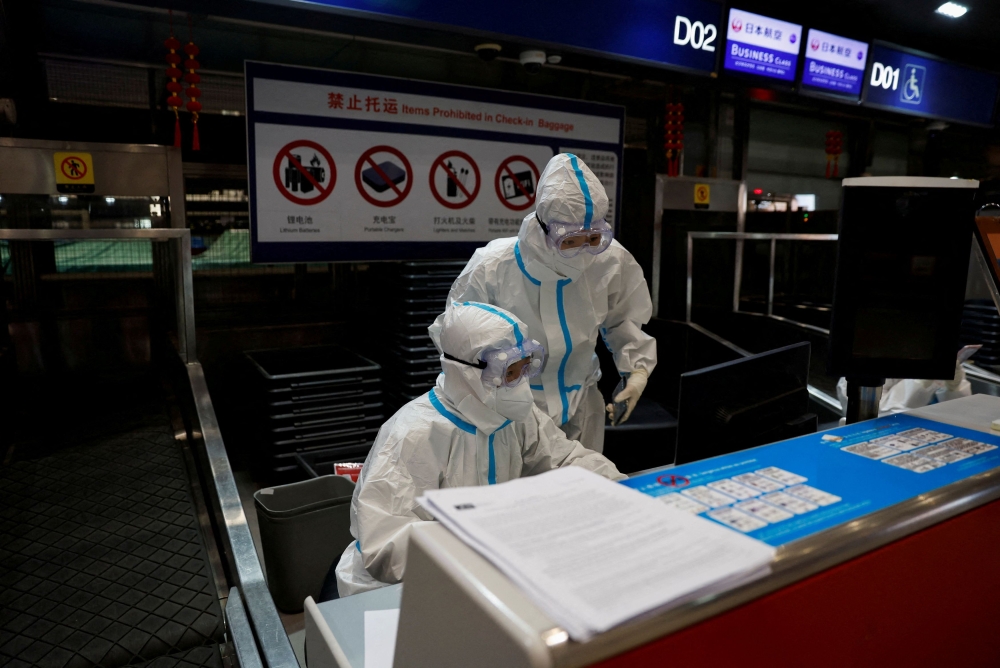 Advisors to the World Health Organisation yesterday urged China to release all information related to the origin of the Covid-19 pandemic after new findings were briefly shared on an international database used to track pathogens. — Reuters pic