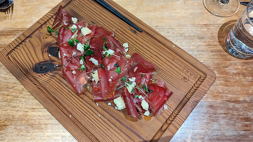Unlike jamón, beef cecina has a smooth texture without a lot of fat, lending itself well to a combination with manchego and truffle honey.
