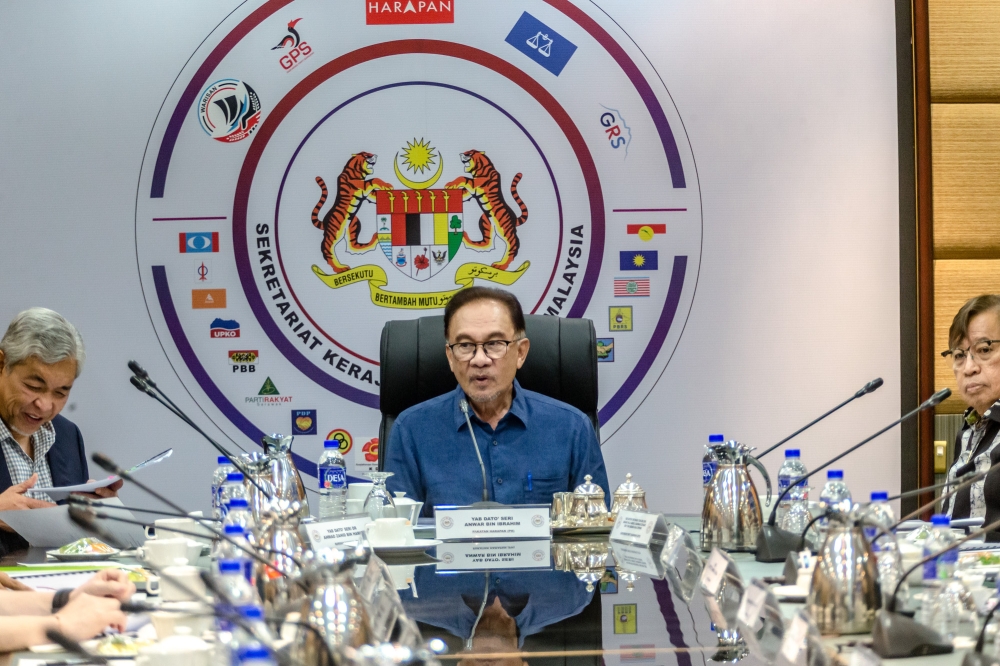 Prime Minister Datuk Seri Anwar Ibrahim chairs the Unity Government Secretariat meeting at the Umno headquarters in Menara Dato’ Onn, Kuala Lumpur March 19, 2023. — Picture by Firdaus Latif