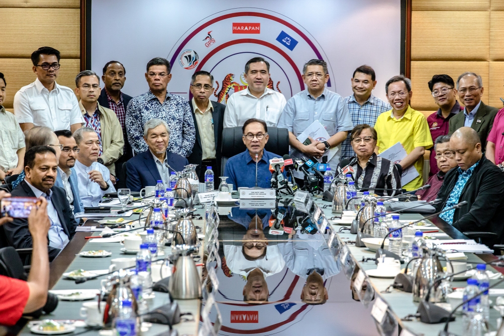 Prime Minister Datuk Seri Anwar Ibrahim speaks during a press conference after chairing the Unity Government Secretariat meeting at the Umno headquarters in Menara Dato’ Onn, Kuala Lumpur March 19, 2023. — Picture by Firdaus Latif 
