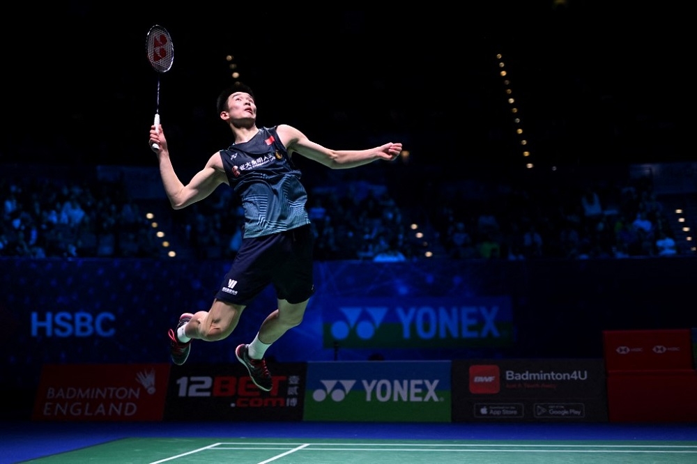 China's Li Shi Feng returns the shuttlecock to China's Yu Qi Shi during the Men's Singles Final at the All England Open Badminton Championships at the Utilita Arena in Birmingham March 19, 2023. — AFP pic