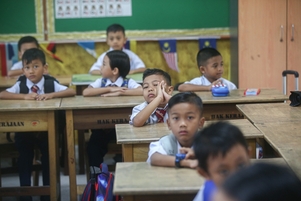 In Perak, a total of 342,482 students from 1,105 schools including 191,260 pupils in 852 primary schools and 151,222 students in 253 secondary schools, started the new academic session. — Picture by Farhan Najib