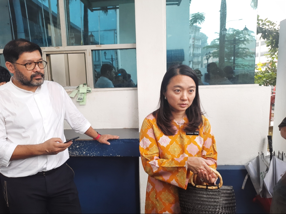 Youth and Sports Minister Hannah Yeoh arrives at the Sentul district police headquarters to give a statement on an investigation on the ‘Jom Ziarah Gereja’ programme in Kuala Lumpur March 20, 2023. — Picture by Keertan Ayamany