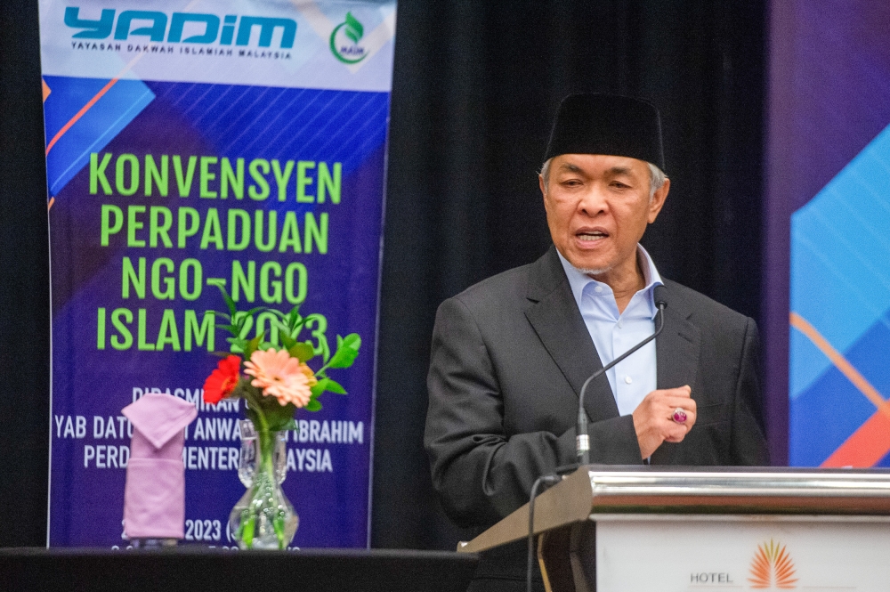Deputy Prime Minister Datuk Seri Ahmad Zahid Hamidi delivers his speech during the closing of the Unity Convention of Islamic NGOs in Bangi, March 21, 2023. —Picture by Shafwan Zaidon