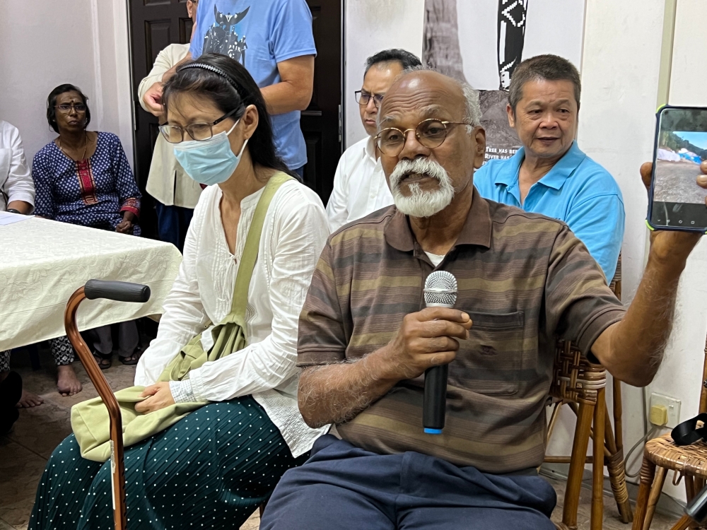 Former assemblyman and affected resident, Dr T. Jeyabalan, said Bukit Hijau is a water catchment area with a waterfall and large boulders on it. — Picture by Opalyn Mok