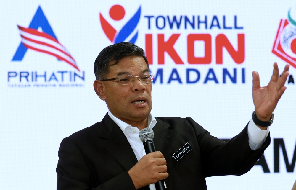 Home Minister Datuk Seri Saifuddin Nasution Ismail speaking when officiating the Madani National Icon (IKON) Townhall Program at Universiti Teknologi Mara (UiTM), Shah Alam, March 22, 2023. — Bernama pic