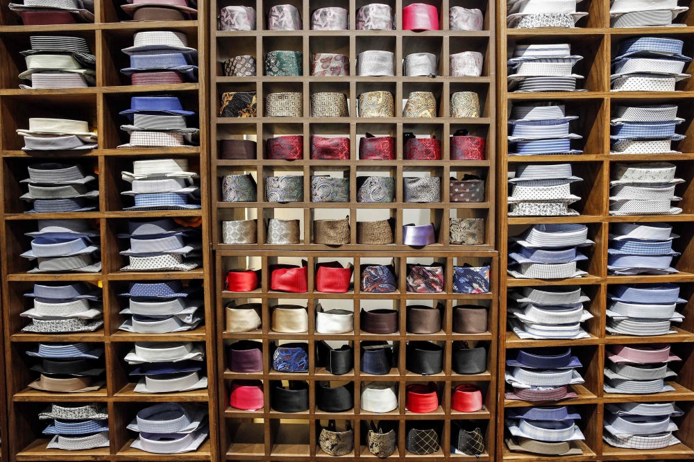 Shirts and ties are displayed at a shop in the north of Iran's capital Tehran on September 7, 2022. — AFP pic