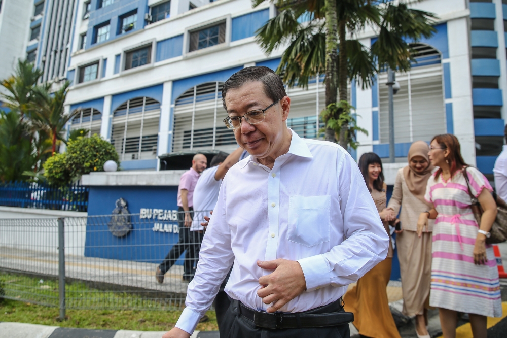 Former finance minister Lim Guan Eng is pictured outside the Dang Wangi District Police headquarters in Kuala Lumpur March 22, 2023. — Picture by Yusof Mat Isa