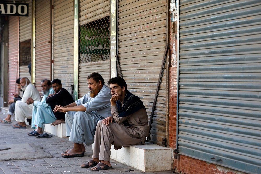 Pakistani professionals struggle with higher costs as economy teeters ...