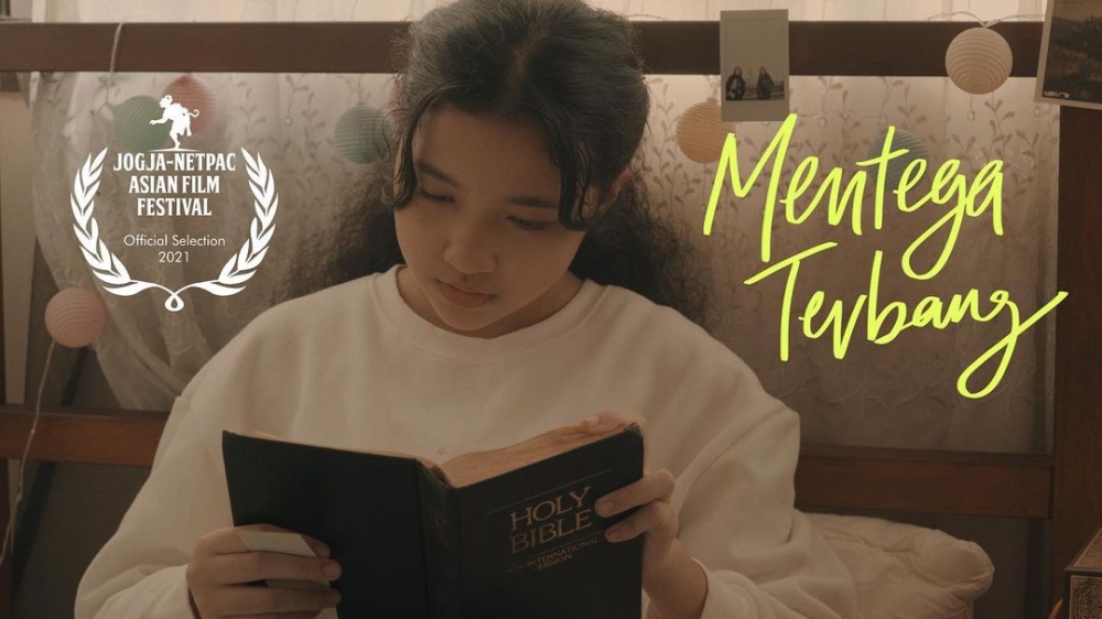 'Mentega Terbang' was hit by a wave of controversy once local netizens started picking up on the fact that its lead character is a teenage Muslim girl trying to learn about other religions in order to figure out where her dying mother would end up when she dies. — Picture via Instagram/MentegaTerbangMovie