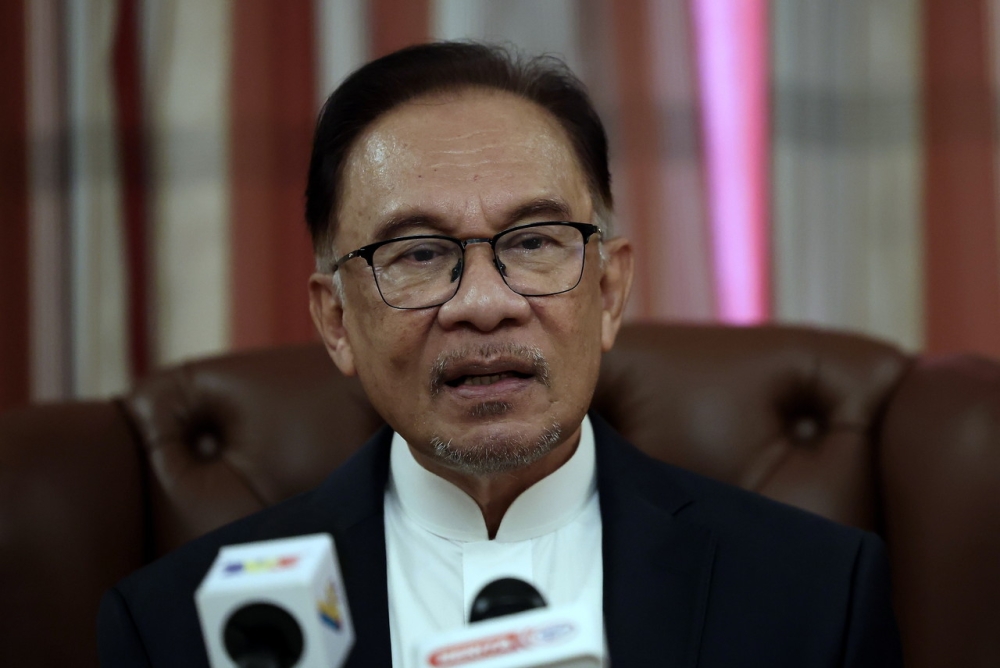 Prime Minister Datuk Seri Anwar Ibrahim speaks during a press conference in Jeddah March 24, 2023. — Bernama pic 