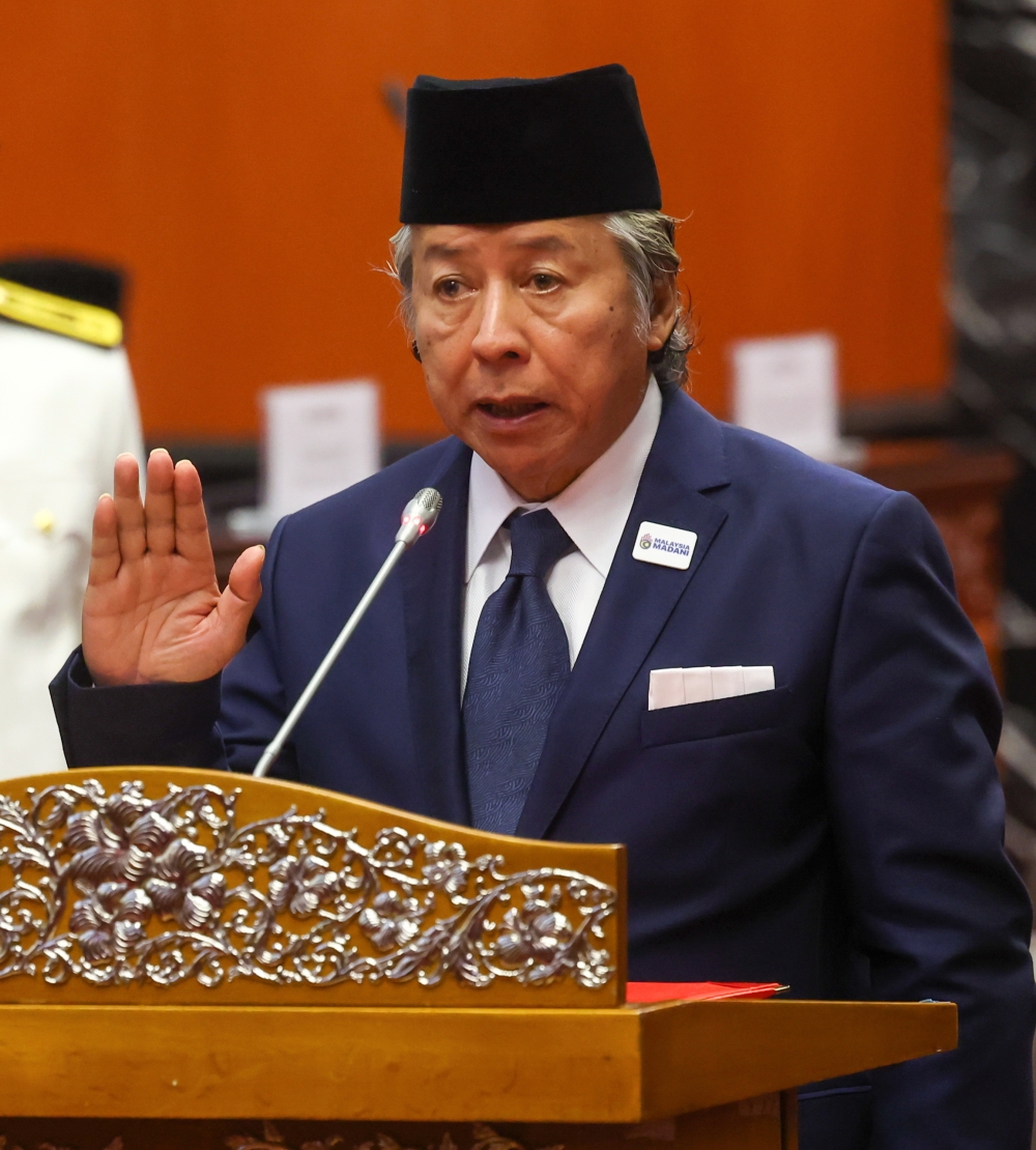 Senator Datuk Seri Anifah Aman takes oath of office at Dewan Negara in Kuala Lumpur March 20, 2023. — Bernama pic