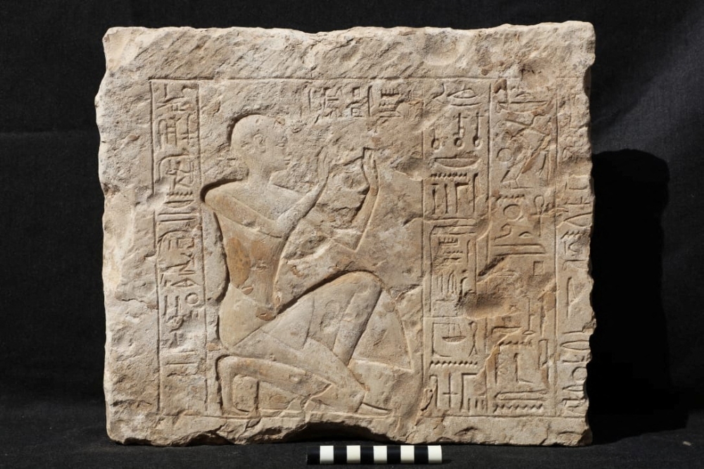 An engraved stone uncovered after excavation work by a team from New York University- Institute for the Study of the Ancient World (ISAW) at the temple of Ramesses II in Abydos, Sohag Governorate, Egypt, in this handout image released on March 25, 2023. — Reuters pic