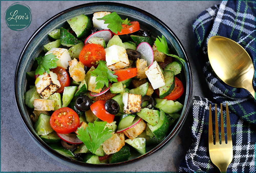 Traditional Fattoush is given a makeover with sourdough mixed with vegetables, haloumi and a spring onion dressing — Picture courtesy of Leen's Middle East Kitchen