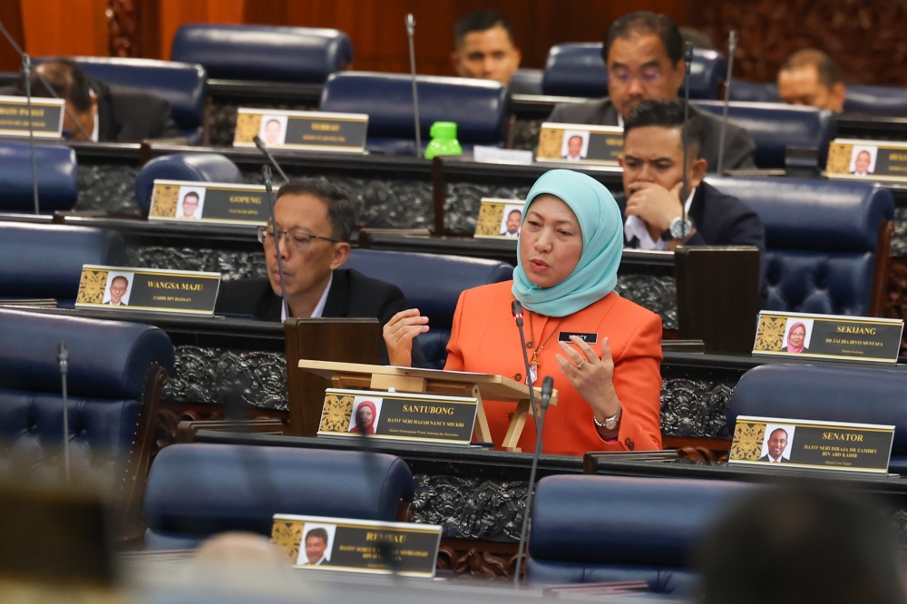 Women, Family and Community Development Minister Datuk Seri Nancy Shukri speaks at the Parliament in Kuala Lumpur March 27, 2023. — Bernama pic