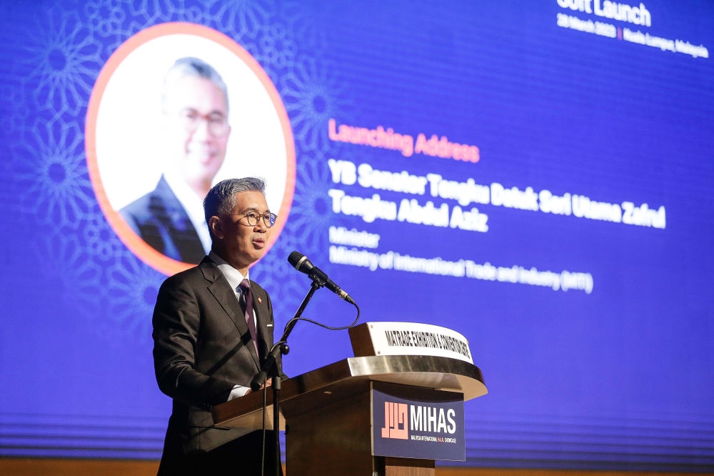 International Trade and Industry Minister Datuk Seri Tengku Zafrul Abdul Aziz delivers a speech at the Malaysia International Halal Showcase  2023 soft launch in Kuala Lumpur March 28, 2023. — Picture by Sayuti Zainudin