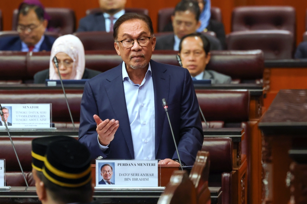 Prime Minister Datuk Seri Anwar Ibrahim speaks at the Parliament in Kuala Lumpur March 29, 2023. — Bernama pic