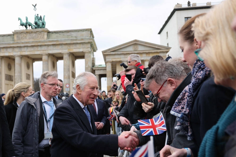 King Charles III met with the public after a ceremonial welcome at Brandenburg Gate in Berlin. — AFP pic