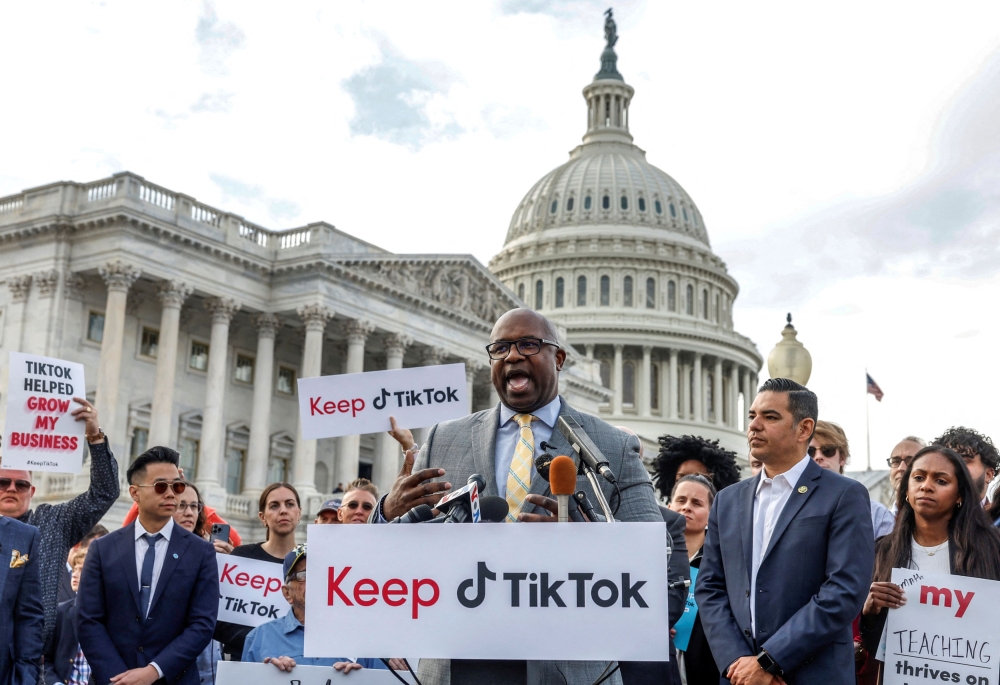TikTok creators at a news conference to speak out against a possible ban of TikTok. — Reuters pic