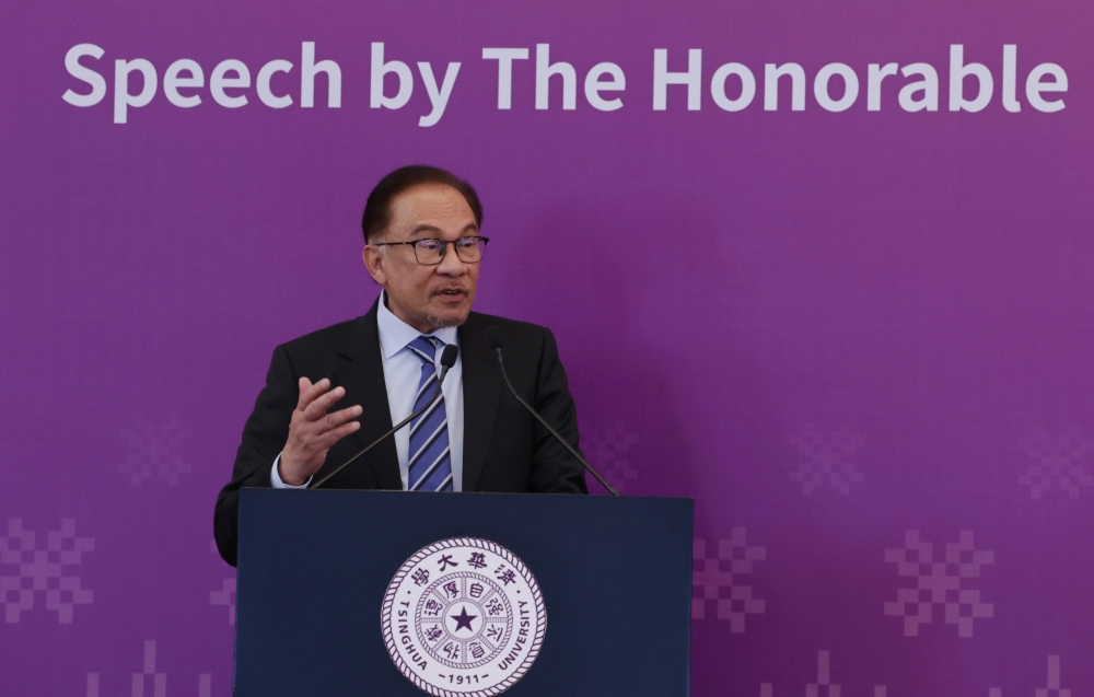 Prime Minister Datuk Seri Anwar Ibrahim speaks during a public lecture at the renowned Tsinghua University in Beijing March 31, 2023. ― Bernama pic