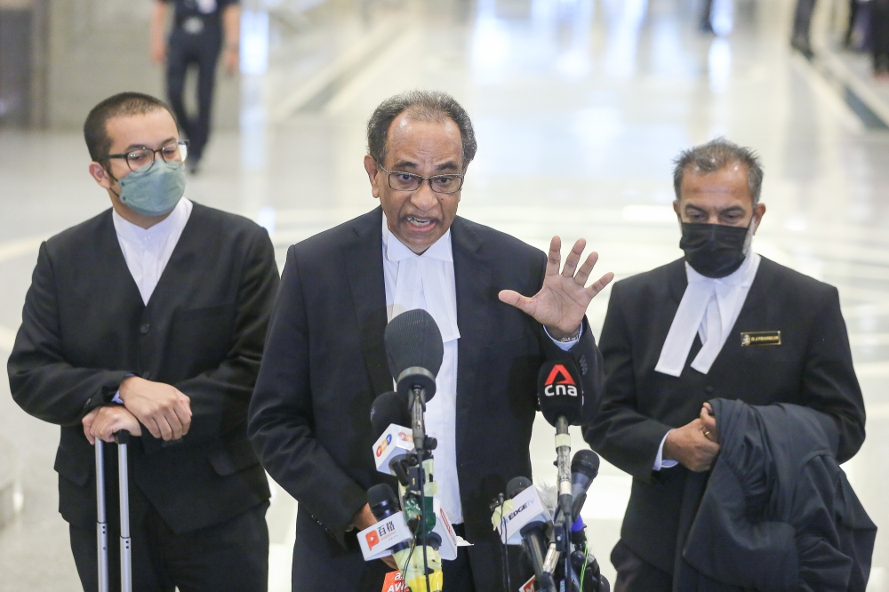 Deputy Public Prosecutor Datuk V. Sithambaram (centre) speaks to reporters at the Federal Court in Putrajaya, March 31, 2023. — Picture by Yusof Mat Isa