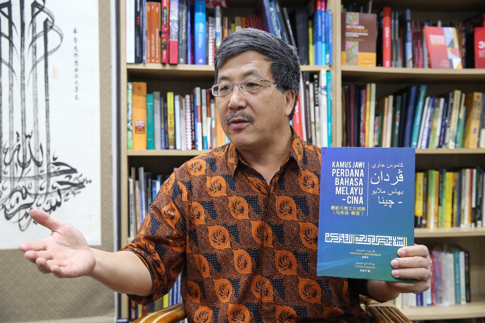 Yusuf Liu speaks to Malay Mail during an interview at his office in Petaling Jaya March 25, 2023. — Picture by Yusof Mat Isa
