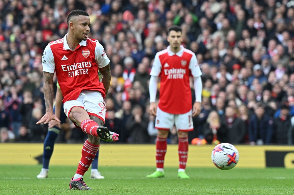 Arsenal's Brazilian striker Gabriel Jesus scores the opening goal from the penalty spot during the English Premier League football match between Arsenal and Leeds United at the Emirates Stadium in London on April 1, 2023. — AFP pic