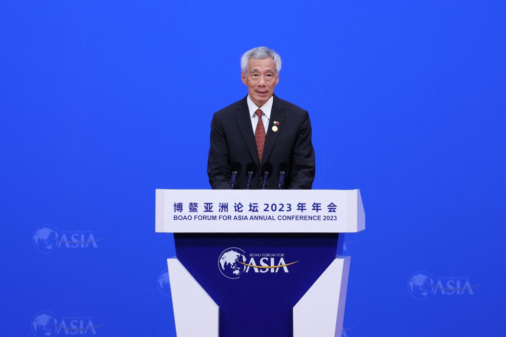 Singaporean Prime Minister Lee Hsien Loong delivers a speech at the opening ceremony of the Boao Forum for Asia Annual Conference 2023, in Boao, Hainan province, China March 30, 2023. — Reuters pic