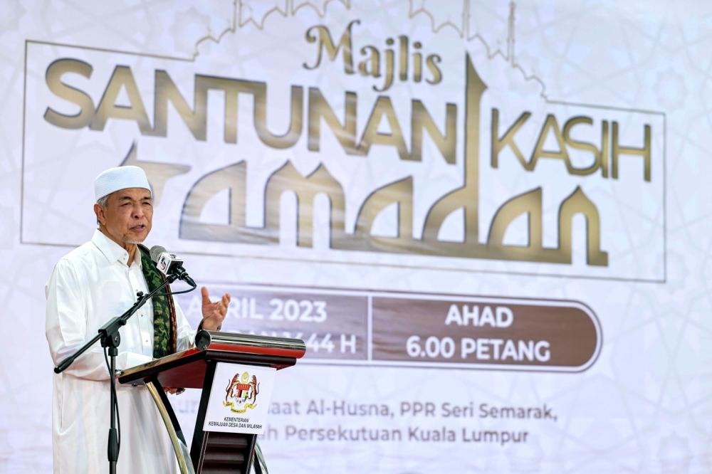 Deputy Prime Minister Datuk Seri Ahmad Zahid Hamidi delivers a speech at the 2023 Santunan Kasih Ramadan programme at Seri Semarak People’s Housing Project in Kuala Lumpur April 2, 2023. — Bernama pic