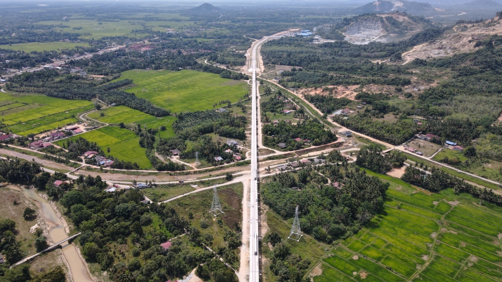 An aerial view of part of the East Coast Rail Link, which is still under construction, is seen near Kampung Mak Lipah in Bachok March 28, 2023. — Bernama pic