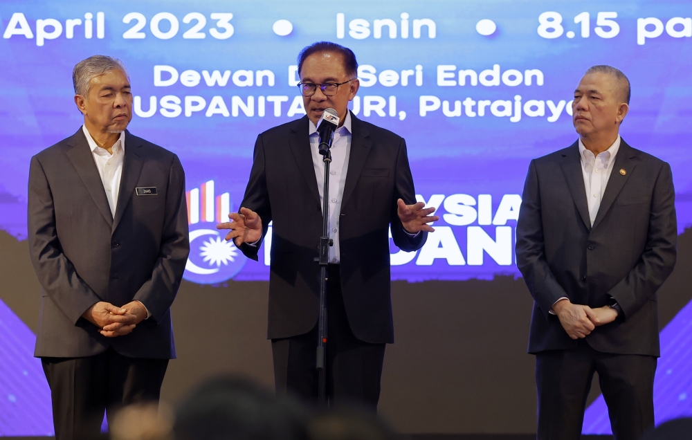 Prime Minister Datuk Seri Anwar Ibrahim (centre) speaks at the Prime Minister’s Monthly Assembly with Staff of the Prime Minister’s Department in Putrajaya April 3, 2023. — Bernama pic