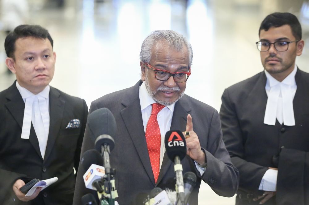 Lawyer Tan Sri Shafee Abdullah speaks to reporters at Federal Court in Putrajaya March 31, 2023. — Picture by Yusof Mat Isa