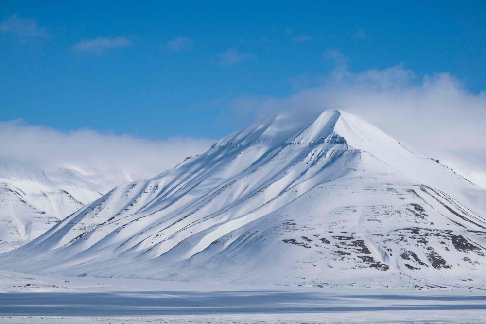 This file photo taken on May 4, 2022 shows a view of mountains near Longyearbyen, located on Spitsbergen island, in Svalbard Archipelago, northern Norway. — AFP pic