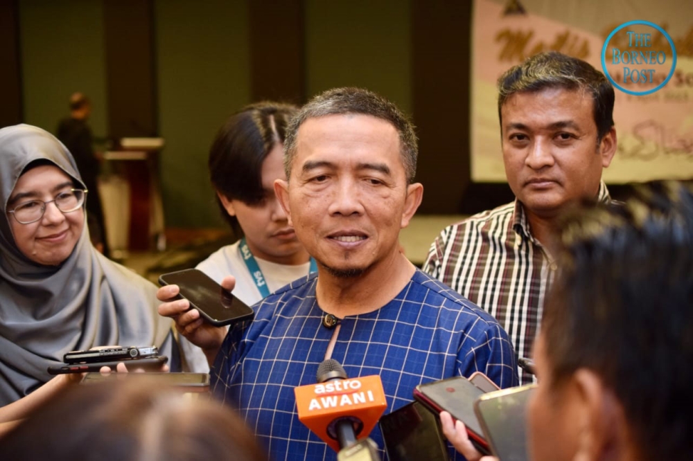 Mohd Nizom speaks to the media after the IRB breaking of fast and media appreciation night. — Picture by Roystein Emmor via Borneo Post