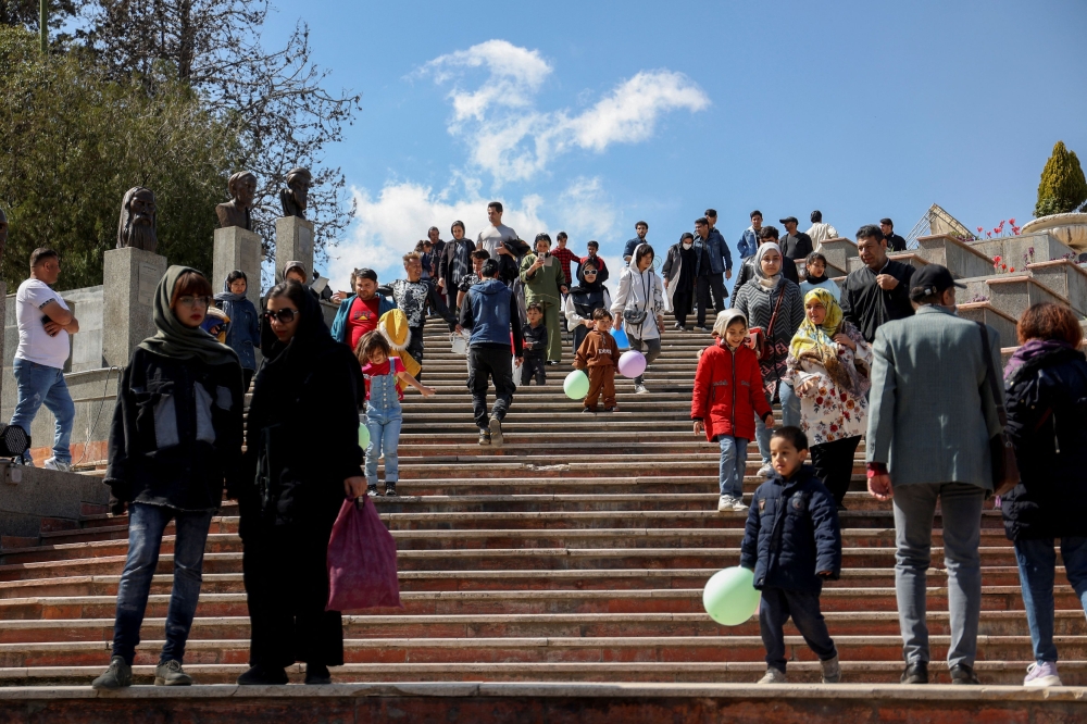 Iranians visit a park on Nature Day in Tehran, Iran, April 2, 2023. — Reuters pic