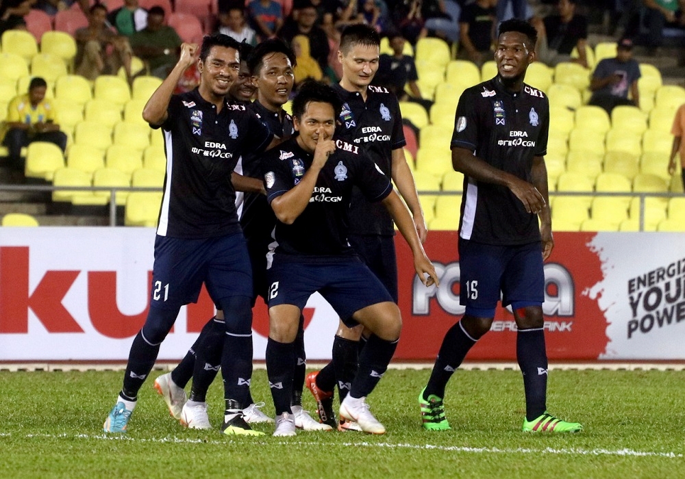 File photo of Melaka United players celebrating after scoring a goal against the Royal Malaysian Police (PDRM) at the Hang Jebat Stadium in Melaka August 26, 2018. - Bernama pic