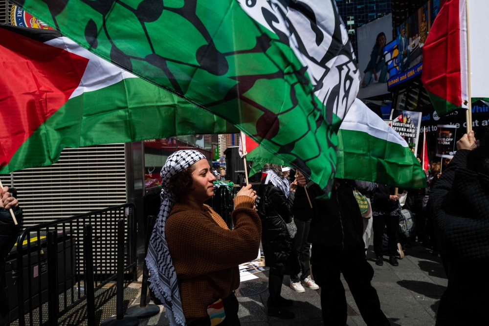 Supporters of Palestine demonstrate in Times Square against recent events between Israel and Palestinians that have resulted in deaths in both communities. — AFP pic