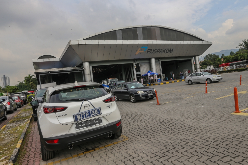 The Computerised Vehicle Inspection Centre (Puspakom) is organising a voluntary vehicle inspection for free to all drivers and private vehicle owners beginning tomorrow until April 20 in a move to ensure safe driving during Aidilfitri. — FIle picture by Hari Anggara