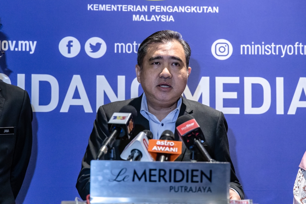 Transport Minister Anthony Loke speaks at a press conference after chairing the National Logistics Task Force meeting in Putrajaya April 11, 2023. — Picture by Firdaus Latif