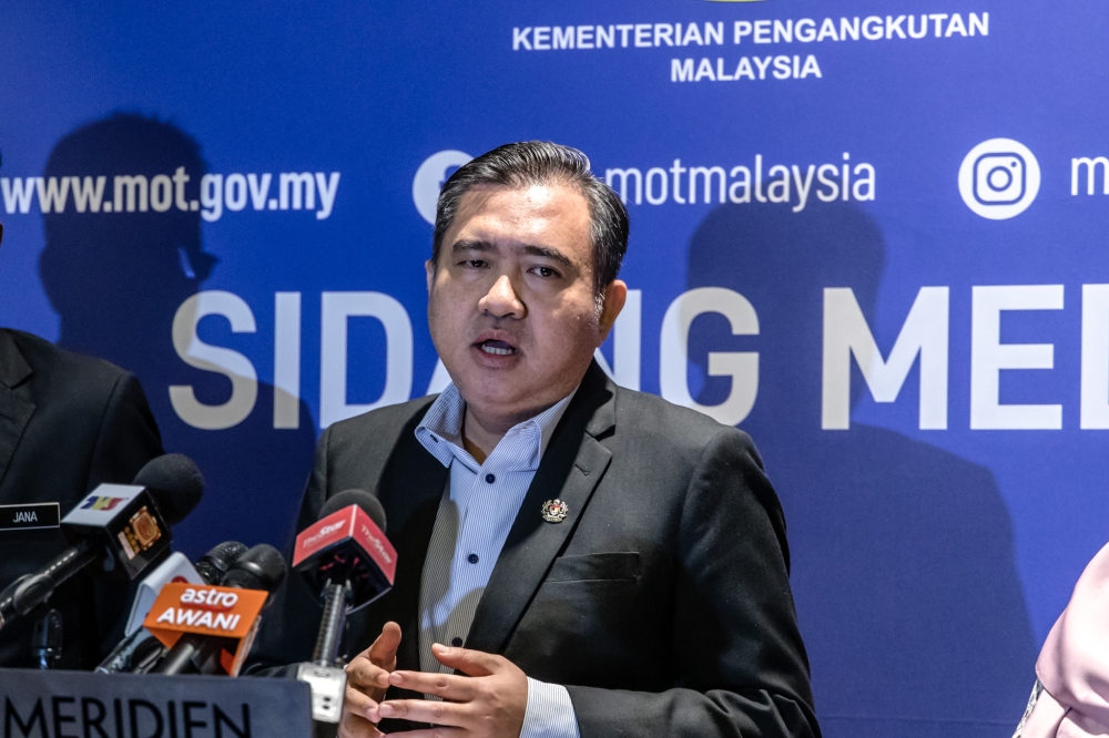 Transport Minister Anthony Loke speaks at a press conference after chairing the National Logistics Task Force meeting in Putrajaya April 11, 2023. — Picture by Firdaus Latif
