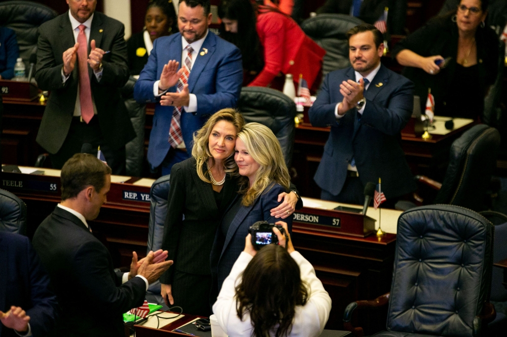 Florida state Rep Jennifer Canady hugs Rep Jenna Persons-Mulicka after the House passed SB 300, which bans abortions after six weeks in Florida, in Tallahassee, Florida April 13, 2023. — Picture by Alicia Devine/USA Today Network/Reuters 