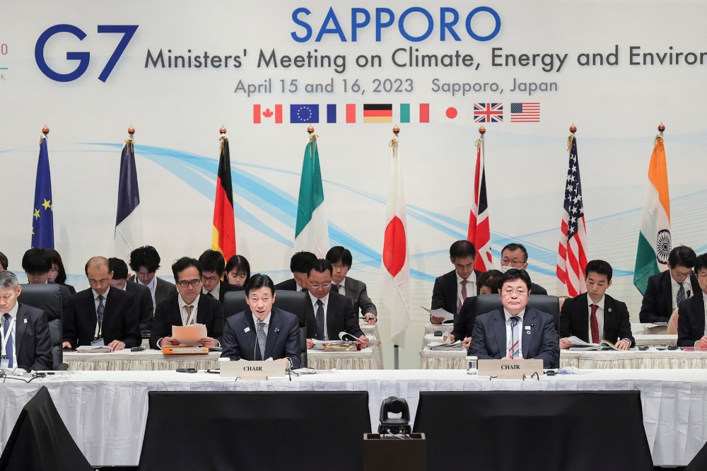 Japan’s Minister of Economy, Trade and Industry Yasutoshi Nishimura (front left) and Minister of the Environment Akihiro Nishimura (front right) attend the G7 Ministers’ Meeting on Climate, Energy and Environment in Sapporo, Hokkaido prefecture on April 15, 2023. — AFP pic