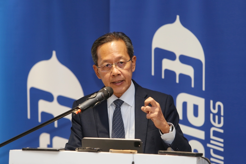 MAG group chief executive officer Izham Ismail speaks during a press conference in Petaling Jaya April 18, 2023. — Picture by Choo Choy May