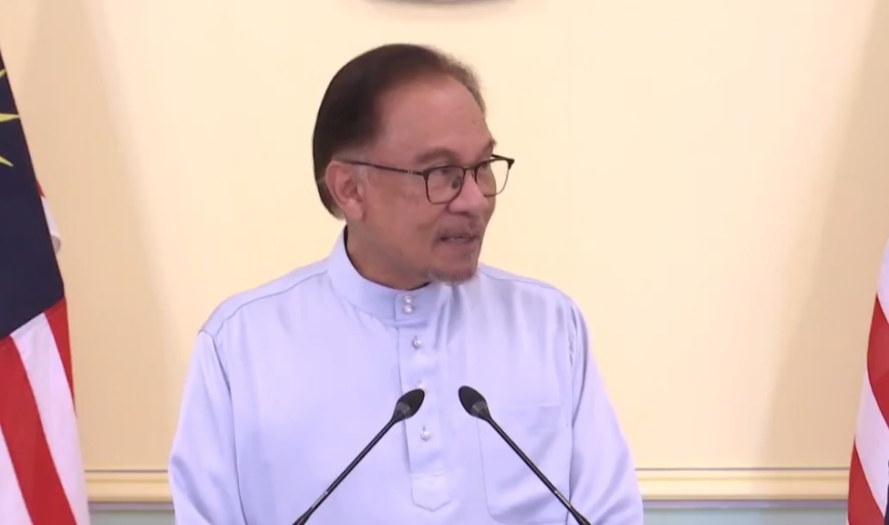 Prime Minister Datuk Seri Anwar Ibrahim speaks during press conference livestreamed on Radio Television Malaysia's Facebook page. ― Screenshot via Facebook/Radio Television Malaysia 