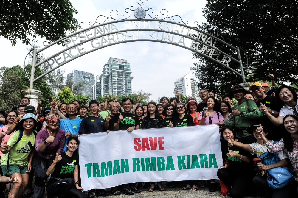 This 2018 file photograph shows people taking part in a rally to oppose a proposed condominium project at Taman Rimba Kiara in Taman Tun Dr Ismail, Kuala Lumpur. —  Picture by Shafwan Zaidon