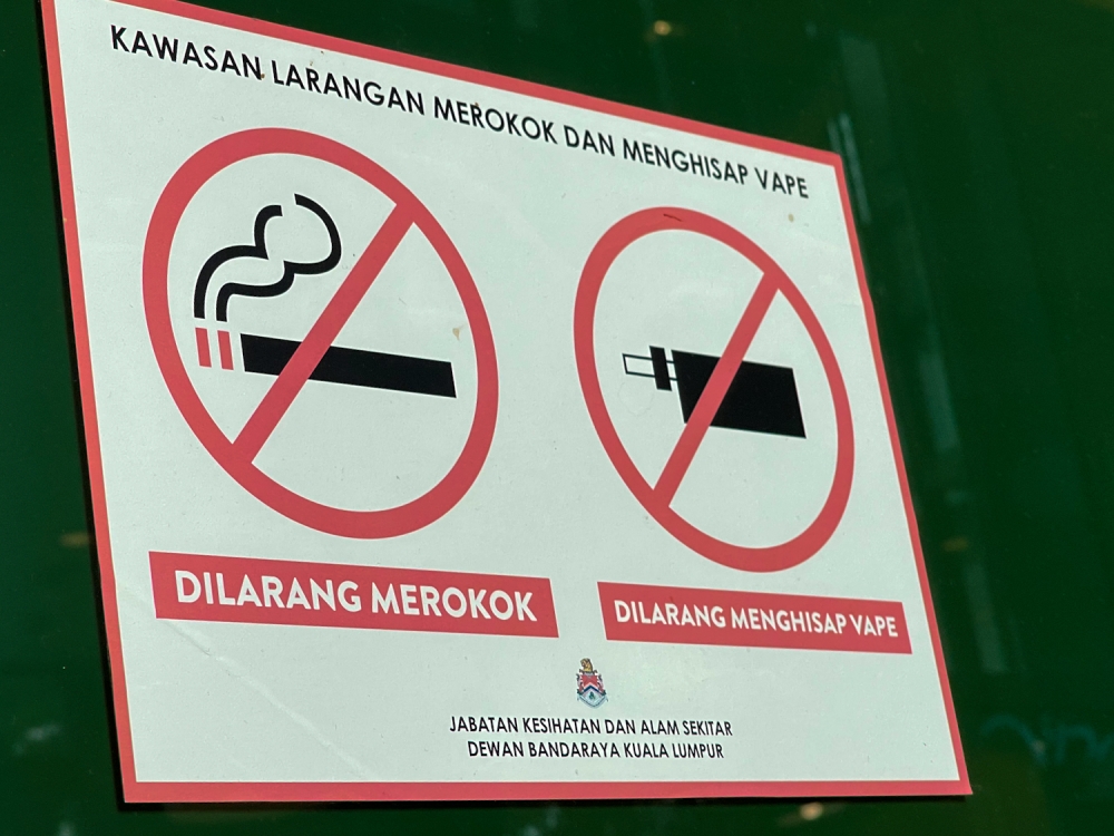 A sign prohibiting cigarettes and vaporisers is seen outside the Cheras Velocity Mall in Kuala Lumpur on August 03, 2022.— Picture by Devan Manuel