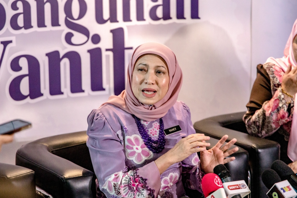 Women, Family and Community Development Minister Datuk Seri Nancy Shukri hoped that the arrival of Syawal would bring happiness to everyone and urged the public, amidst the joyous celebration, to also not forget the underprivileged. — Picture by Firdaus Latif