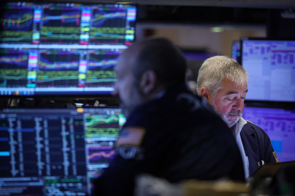 Global stocks edge down, US yields climb after PMI data | Malay Mail