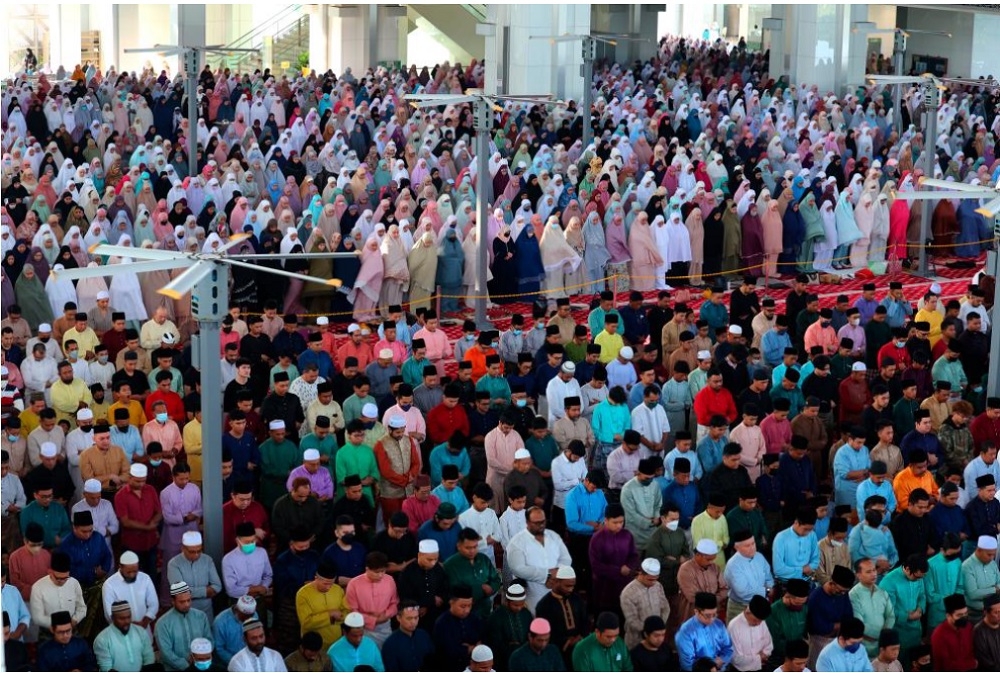Muslims celebrated 1 Syawal today by gathering to perform Aidilfitri prayers at mosques and suraus nationwide. — Bernama pic